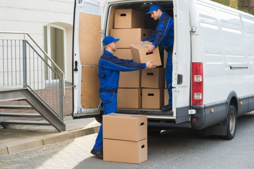 Office relocation planning in Southkensington with moving boxes and business equipment