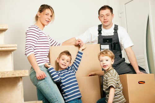 Specialist movers securing a piano for transport in Southkensington
