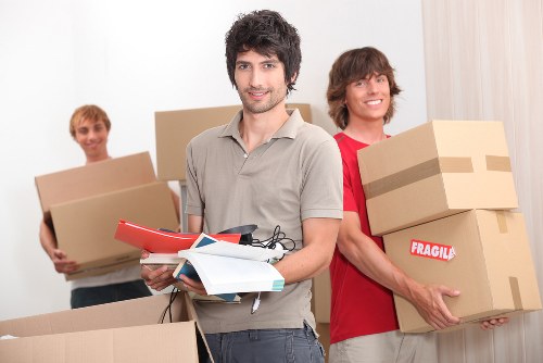 House removal team handling fragile items during a South Kensington relocation