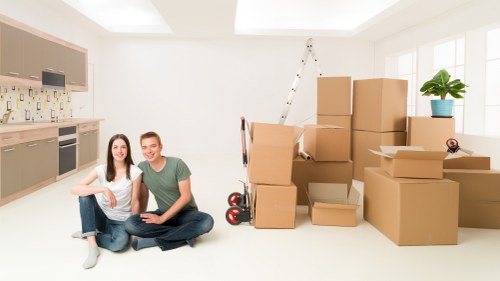 Careful packing materials for fragile items during a flat removal