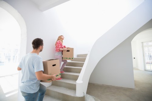 Fragile household items carefully wrapped by packing professionals
